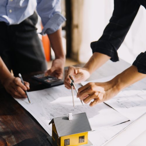 Architect concept, Architects working with blueprints in the office, Vintage Effect